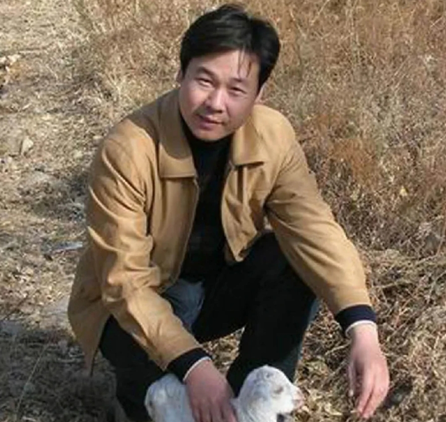 陈 健